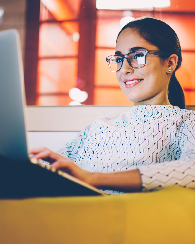 Lady looking at laptop